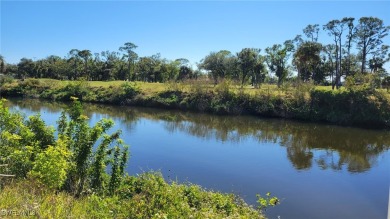 Beautiful waterfront lot located across the canal from golf on Burnt Store Golf Club in Florida - for sale on GolfHomes.com, golf home, golf lot