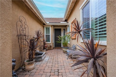Listing courtesy of Lori Robinson, Coldwell Banker ABR on Menifee Lakes Country Club - Lakes in California - for sale on GolfHomes.com, golf home, golf lot