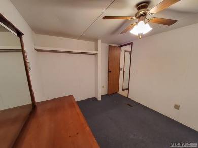 Comfy home in a water front community with lake access. This 2 on River Ridge Golf Club in Virginia - for sale on GolfHomes.com, golf home, golf lot