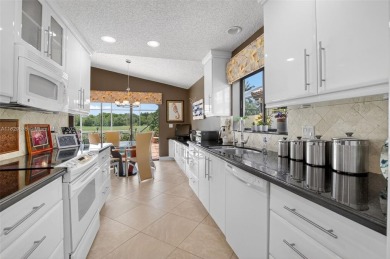Tucked into an all-age country club in scenic west Boca Raton on  in Florida - for sale on GolfHomes.com, golf home, golf lot