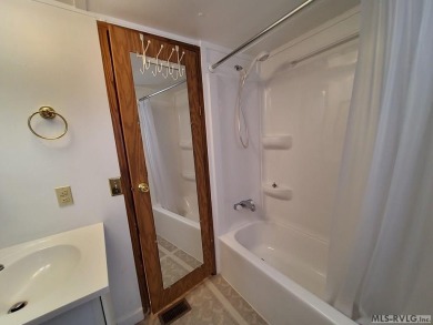 Comfy home in a water front community with lake access. This 2 on River Ridge Golf Club in Virginia - for sale on GolfHomes.com, golf home, golf lot