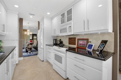 Tucked into an all-age country club in scenic west Boca Raton on  in Florida - for sale on GolfHomes.com, golf home, golf lot