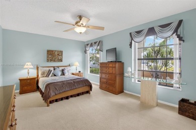 Tucked into an all-age country club in scenic west Boca Raton on  in Florida - for sale on GolfHomes.com, golf home, golf lot