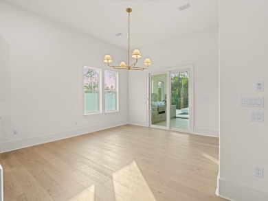 Designed by renowned architect John Williams, this elegant new on Camp Creek Golf Course in Florida - for sale on GolfHomes.com, golf home, golf lot