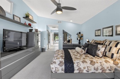 Tucked into an all-age country club in scenic west Boca Raton on  in Florida - for sale on GolfHomes.com, golf home, golf lot