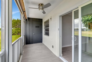 Welcome to 164 Normandy Lane, a stunning corner unit situated on on Kings Point Golf -Flanders Way in Florida - for sale on GolfHomes.com, golf home, golf lot