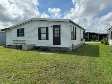 Affordable Living in Swiss Golf on Lot Lease Which is Currently on Lake Henry Golf Club in Florida - for sale on GolfHomes.com, golf home, golf lot