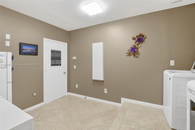 Tucked into an all-age country club in scenic west Boca Raton on  in Florida - for sale on GolfHomes.com, golf home, golf lot