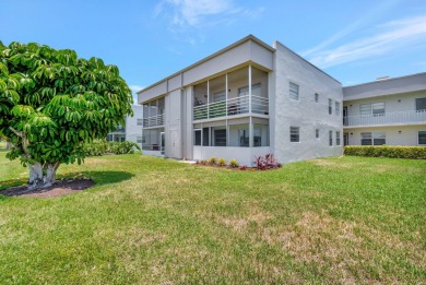 Welcome to 164 Normandy Lane, a stunning corner unit situated on on Kings Point Golf -Flanders Way in Florida - for sale on GolfHomes.com, golf home, golf lot