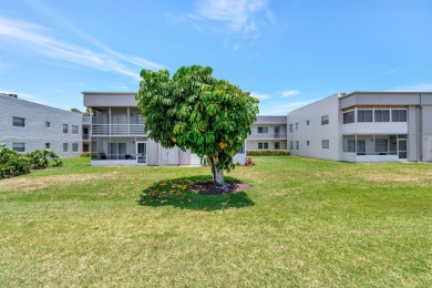 Welcome to 164 Normandy Lane, a stunning corner unit situated on on Kings Point Golf -Flanders Way in Florida - for sale on GolfHomes.com, golf home, golf lot