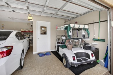 Tucked into an all-age country club in scenic west Boca Raton on  in Florida - for sale on GolfHomes.com, golf home, golf lot