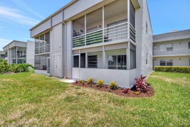 Welcome to 164 Normandy Lane, a stunning corner unit situated on on Kings Point Golf -Flanders Way in Florida - for sale on GolfHomes.com, golf home, golf lot