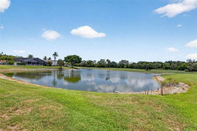 Tucked into an all-age country club in scenic west Boca Raton on  in Florida - for sale on GolfHomes.com, golf home, golf lot