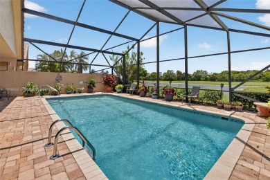 Tucked into an all-age country club in scenic west Boca Raton on  in Florida - for sale on GolfHomes.com, golf home, golf lot