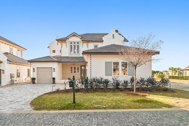 Less than a mile from the beach, this breathtaking new on Regatta Bay Golf and Country Club in Florida - for sale on GolfHomes.com, golf home, golf lot