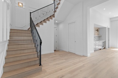 Less than a mile from the beach, this breathtaking new on Regatta Bay Golf and Country Club in Florida - for sale on GolfHomes.com, golf home, golf lot