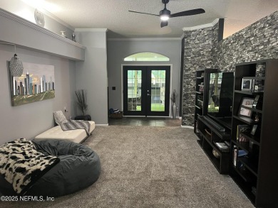 Nestled in the sought-after Southern Links community of Fleming on Golf Club At Fleming Island in Florida - for sale on GolfHomes.com, golf home, golf lot