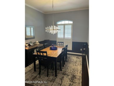 Nestled in the sought-after Southern Links community of Fleming on Golf Club At Fleming Island in Florida - for sale on GolfHomes.com, golf home, golf lot