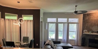 Nestled in the sought-after Southern Links community of Fleming on Golf Club At Fleming Island in Florida - for sale on GolfHomes.com, golf home, golf lot