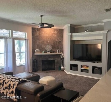 Nestled in the sought-after Southern Links community of Fleming on Golf Club At Fleming Island in Florida - for sale on GolfHomes.com, golf home, golf lot