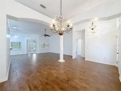 Welcome to this beautifully maintained 3-bedroom, 2-bath home on Lakes of Lady Lake Golf Course in Florida - for sale on GolfHomes.com, golf home, golf lot