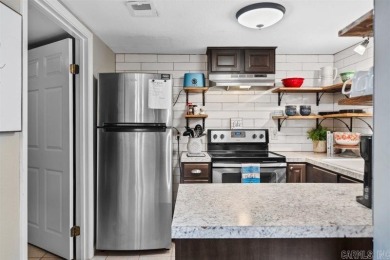 SEE AGENT REMARKS. Nicely updated townhouse near Lake DeSoto on DeSoto Golf Course in Arkansas - for sale on GolfHomes.com, golf home, golf lot