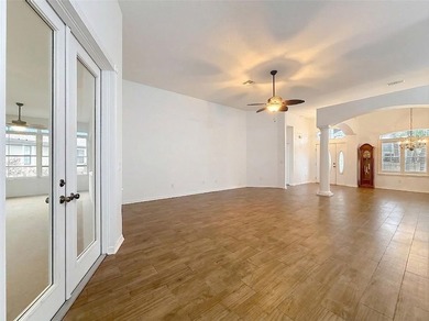 Welcome to this beautifully maintained 3-bedroom, 2-bath home on Lakes of Lady Lake Golf Course in Florida - for sale on GolfHomes.com, golf home, golf lot