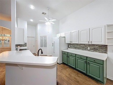 Welcome to this beautifully maintained 3-bedroom, 2-bath home on Lakes of Lady Lake Golf Course in Florida - for sale on GolfHomes.com, golf home, golf lot