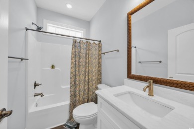 This cottage style home offers three bedrooms and two fully on Beachwood Golf Club in South Carolina - for sale on GolfHomes.com, golf home, golf lot