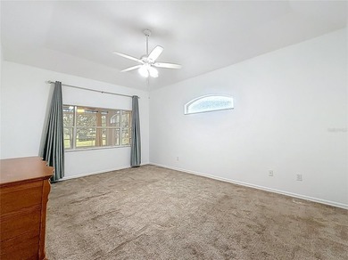 Welcome to this beautifully maintained 3-bedroom, 2-bath home on Lakes of Lady Lake Golf Course in Florida - for sale on GolfHomes.com, golf home, golf lot