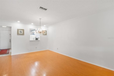 One or more photo(s) has been virtually staged. Step into on Highland Lakes Executive Golf Course in Florida - for sale on GolfHomes.com, golf home, golf lot