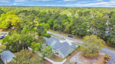 This cottage style home offers three bedrooms and two fully on Beachwood Golf Club in South Carolina - for sale on GolfHomes.com, golf home, golf lot