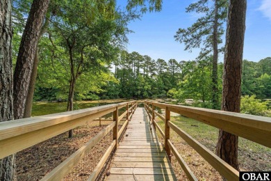 Pondfront Living in Southern Shores - A Private Waterfront on Duck Woods Country Club in North Carolina - for sale on GolfHomes.com, golf home, golf lot
