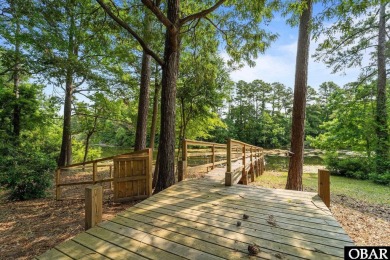 Pondfront Living in Southern Shores - A Private Waterfront on Duck Woods Country Club in North Carolina - for sale on GolfHomes.com, golf home, golf lot