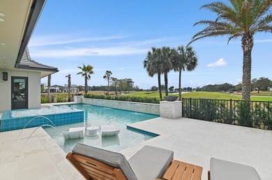 Less than a mile from the beach! Welcome to Tradewinds, the on Regatta Bay Golf and Country Club in Florida - for sale on GolfHomes.com, golf home, golf lot