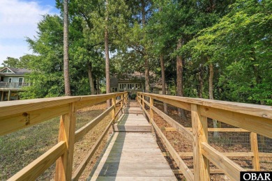 Pondfront Living in Southern Shores - A Private Waterfront on Duck Woods Country Club in North Carolina - for sale on GolfHomes.com, golf home, golf lot
