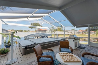 Welcome to true waterfront living in Palm Coast, positioned on a on Palm Harbor Golf Club in Florida - for sale on GolfHomes.com, golf home, golf lot