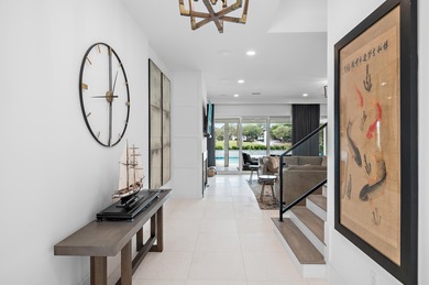 Less than a mile from the beach! Welcome to Tradewinds, the on Regatta Bay Golf and Country Club in Florida - for sale on GolfHomes.com, golf home, golf lot