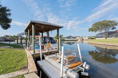 Welcome to true waterfront living in Palm Coast, positioned on a on Palm Harbor Golf Club in Florida - for sale on GolfHomes.com, golf home, golf lot
