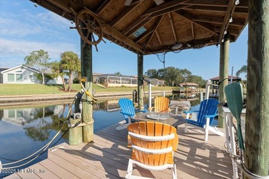 Welcome to true waterfront living in Palm Coast, positioned on a on Palm Harbor Golf Club in Florida - for sale on GolfHomes.com, golf home, golf lot