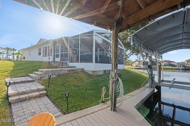 Welcome to true waterfront living in Palm Coast, positioned on a on Palm Harbor Golf Club in Florida - for sale on GolfHomes.com, golf home, golf lot