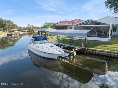 Welcome to true waterfront living in Palm Coast, positioned on a on Palm Harbor Golf Club in Florida - for sale on GolfHomes.com, golf home, golf lot