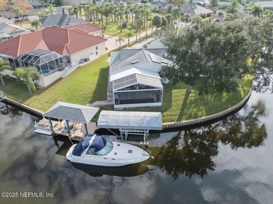 Welcome to true waterfront living in Palm Coast, positioned on a on Palm Harbor Golf Club in Florida - for sale on GolfHomes.com, golf home, golf lot