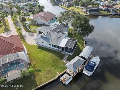 Welcome to true waterfront living in Palm Coast, positioned on a on Palm Harbor Golf Club in Florida - for sale on GolfHomes.com, golf home, golf lot