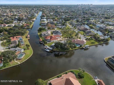 Welcome to true waterfront living in Palm Coast, positioned on a on Palm Harbor Golf Club in Florida - for sale on GolfHomes.com, golf home, golf lot