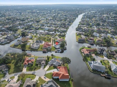 Welcome to true waterfront living in Palm Coast, positioned on a on Palm Harbor Golf Club in Florida - for sale on GolfHomes.com, golf home, golf lot