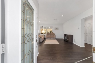 This stunning Coral Gables model was remodeled in 2021-2022 on Eagle Ridge At Spruce Creek Country Club in Florida - for sale on GolfHomes.com, golf home, golf lot