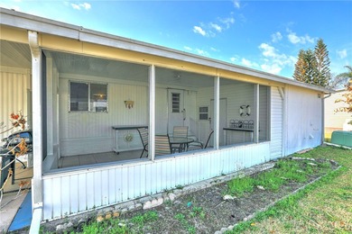 Cute and cozy fully furnished home offering relaxed on Barefoot Bay Golf Course in Florida - for sale on GolfHomes.com, golf home, golf lot