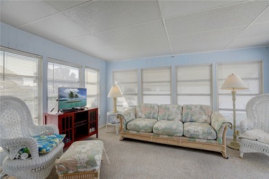 Cute and cozy fully furnished home offering relaxed on Barefoot Bay Golf Course in Florida - for sale on GolfHomes.com, golf home, golf lot