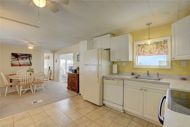 Cute and cozy fully furnished home offering relaxed on Barefoot Bay Golf Course in Florida - for sale on GolfHomes.com, golf home, golf lot